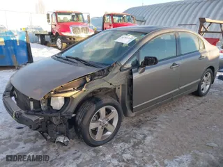 2008 Honda Civic Sdn EX with VIN 2HGFA15838H303858, listed as a IAAI auction lot 41361141 with 163,990 mi miles. Bid and sale history available at carsss.com. Image 2.