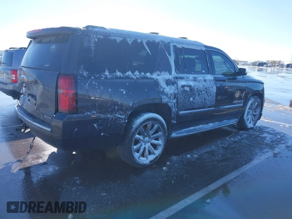 2017 Chevrolet Suburban Premier z VIN 1GNSKJKC0HR274605, wystawiony jako IAAI lot #41828392 z przebiegiem 144 747 mil mil oraz . Historia ofert i sprzedaży dostępna na DreamBid. Obrazek 4.