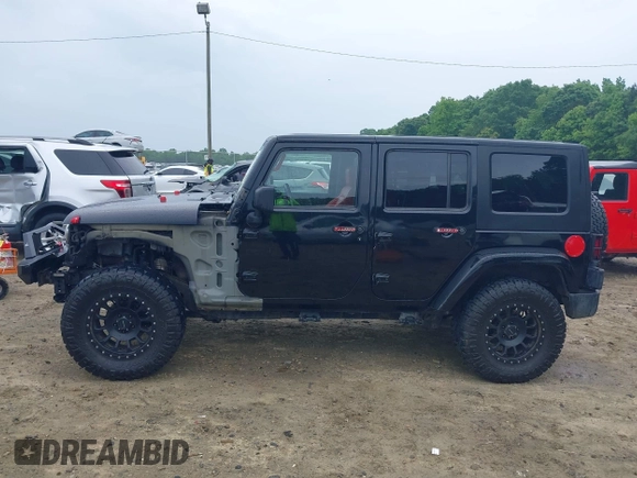 2008 Jeep Wrangler Unlimited Sahara with VIN 1J4GA59128L504798, listed as a IAAI auction lot 42210839 with 162,406 mi miles and . Bid and sale history available at DreamBid. Image 15.
