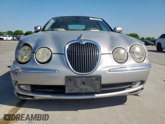 2003 Jaguar S-Type with VIN SAJEA01T43FM62477, listed as a Copart auction lot 52693085 with 109,761 mi miles and Salvage Title. Bid and sale history available at DreamBid. Image 5.