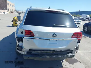 2018 Volkswagen Atlas SE с VIN 1V2DR2CA9JC502205, выставлен на аукционе IAAI как лот 41983821 с пробегом 99 618 миль миль и . История ставок и продаж доступна на DreamBid. Изображение 6.