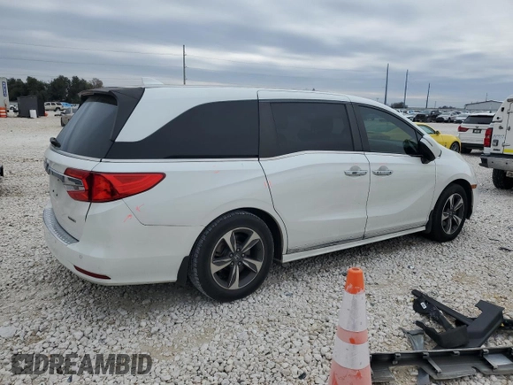 2020 Honda Odyssey Touring with VIN 5FNRL6H88LB014164, listed as a Copart auction lot 42925415 with 67,667 mi miles and Salvage title. Bid and sale history available at DreamBid. Image 3.