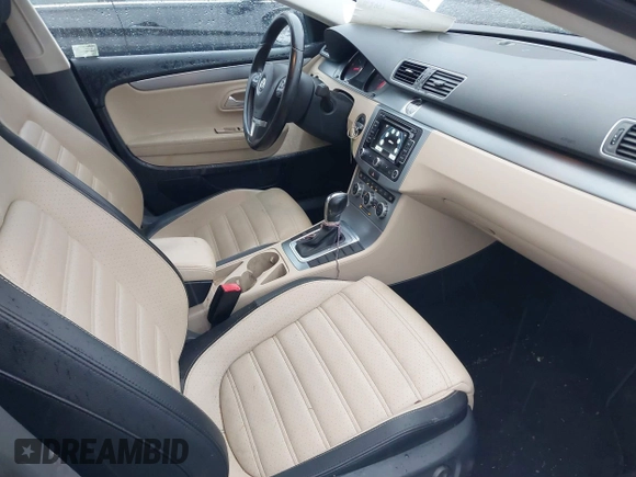2013 Volkswagen CC Lux with VIN WVWRP7AN5DE554388, listed as a IAAI auction lot 41004116 with 162,457 mi miles. Bid and sale history available at carsss.com. Image 5.