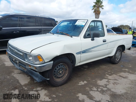 1992 Toyota Pickup DLX z VIN 4TARN81PXNZ004395, wystawiony jako IAAI lot #41729264 z przebiegiem 137 289 mil mil oraz . Historia ofert i sprzedaży dostępna na DreamBid. Obrazek 2.