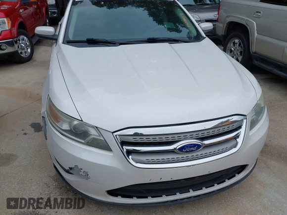 2012 Ford Taurus SEL with VIN 1FAHP2EW4CG130131, listed as a IAAI auction lot 42079457 with 162,101 mi miles and . Bid and sale history available at DreamBid. Image 6.