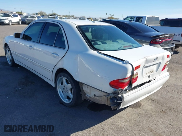 2002 Mercedes-Benz E-Class with VIN WDBJF82J62X076581, listed as a IAAI auction lot 41194976 with 235,453 mi miles. Bid and sale history available at carsss.com. Image 6.