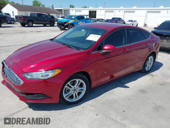 2018 Ford Fusion SE z VIN 3FA6P0LU9JR279976, wystawiony jako IAAI lot #41792558 z przebiegiem 115 790 mil mil oraz . Historia ofert i sprzedaży dostępna na DreamBid. Obrazek 2.
