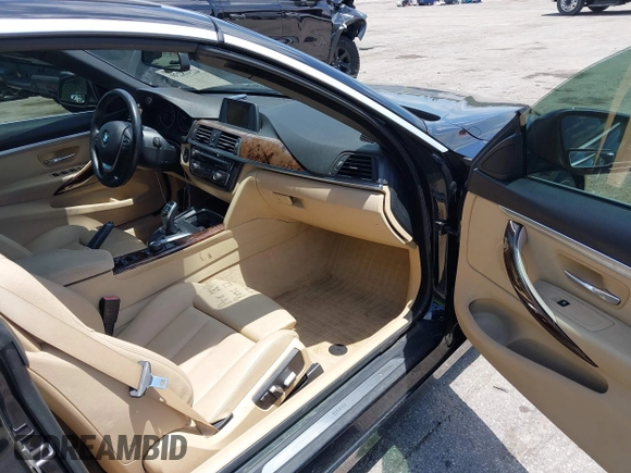 2016 BMW 4 Series 428i z VIN WBA3V7C54G5A25320, wystawiony jako IAAI lot #42318239 z przebiegiem 74 884 mil mil oraz . Historia ofert i sprzedaży dostępna na DreamBid. Obrazek 5.