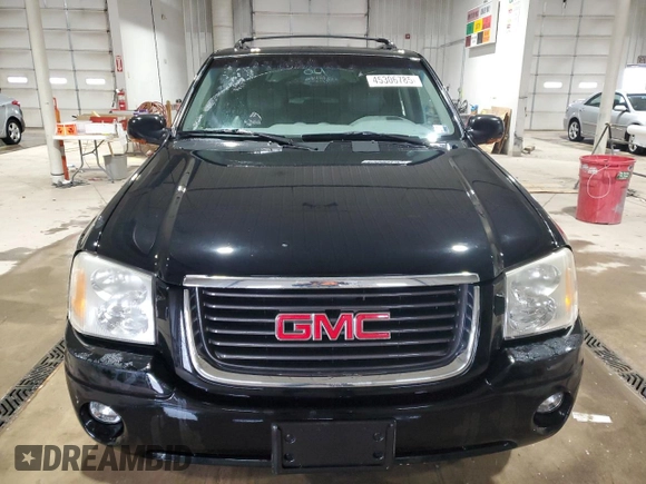 2003 GMC Envoy SLT with VIN 1GKDT13S232251871, listed as a Copart auction lot 45306785 with 174,303 mi miles and Salvage Title. Bid and sale history available at carsss.com. Image 5.