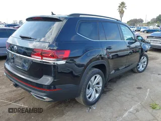 2021 Volkswagen Atlas SE z VIN 1V2WR2CAXMC558294, wystawiony jako IAAI lot #41447619 z przebiegiem 48 652 mil mil oraz . Historia ofert i sprzedaży dostępna na DreamBid. Obrazek 4.