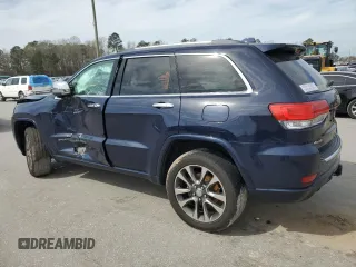 2017 Jeep Grand Cherokee Overland with VIN 1C4RJFCG6HC602413, listed as a Copart auction lot 49641325 with 157,558 mi miles and Salvage Title. Bid and sale history available at carsss.com. Image 2.
