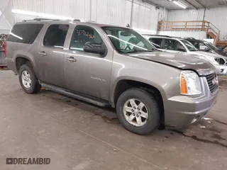 2013 GMC Yukon XL SLT with VIN 1GKS2KE71DR213758, listed as a IAAI auction lot 41713240 with 193,611 mi miles. Bid and sale history available at carsss.com. Image 1.
