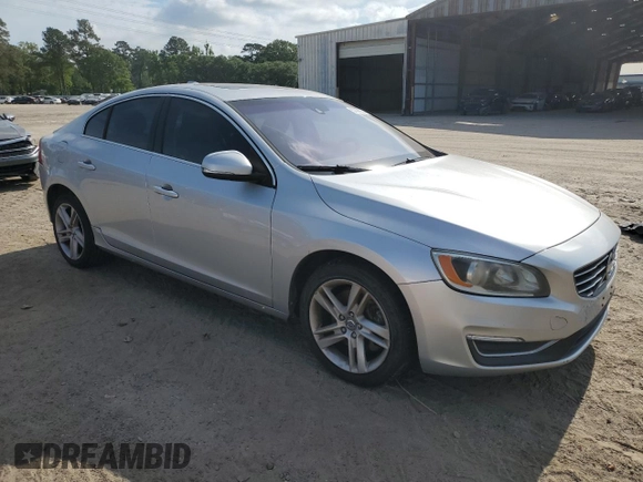 2014 Volvo S60 T5 z VIN YV1612FS3E2295726, wystawiony jako Copart lot #57293655 z przebiegiem 100 670 mil mil oraz Czysty tytuł • Clean title. Historia ofert i sprzedaży dostępna na DreamBid. Obrazek 4.