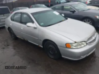 2001 Nissan Altima GXE with VIN 1N4DL01D31C141385, listed as a IAAI auction lot 41827462 with 238,355 mi miles. Bid and sale history available at carsss.com. Image 1.
