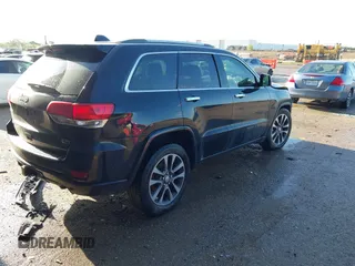 2018 Jeep Grand Cherokee High Altitude with VIN 1C4RJFCT3JC184895, listed as a IAAI auction lot 42093537 with 97,088 mi miles and . Bid and sale history available at DreamBid. Image 4.