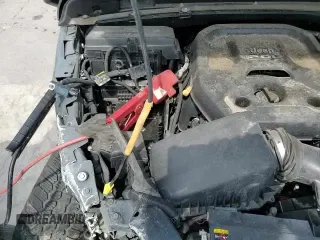 2021 Jeep Wrangler Unlimited Sport Altitude with VIN 1C4HJXDN0MW509619, listed as a Copart auction lot 66619475 with 54,606 mi miles and Salvage title. Bid and sale history available at DreamBid. Image 17.