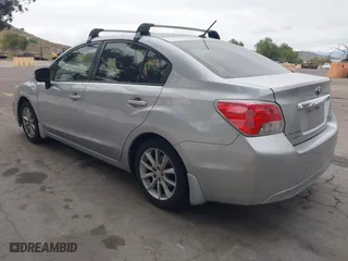 2012 Subaru Impreza Sedan 2.0i Premium with VIN JF1GJAC68CH026374, listed as a IAAI auction lot 42063409 with 160,167 mi miles. Bid and sale history available at carsss.com. Image 3.
