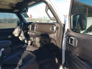 2019 Jeep Wrangler Unlimited Sahara with VIN 1C4HJXEN1KW687924, listed as a IAAI auction lot 41082030 with 65,852 mi miles. Bid and sale history available at carsss.com. Image 5.