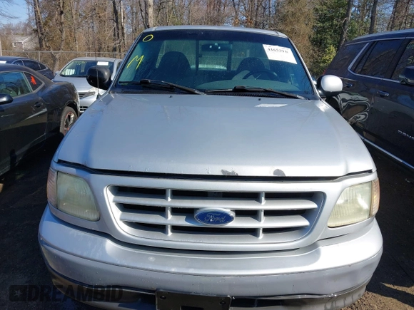 2002 Ford F-150 XL with VIN 1FTRF17222NC00760, listed as a IAAI auction lot 41653940 with 314,637 mi miles. Bid and sale history available at carsss.com. Image 12.