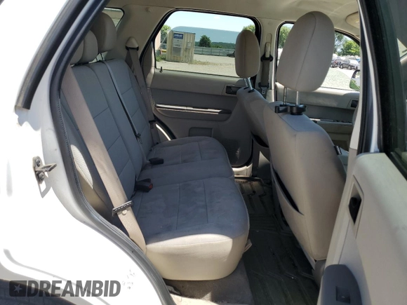 2012 Ford Escape XLT z VIN 1FMCU9DG3CKA09843, wystawiony jako Copart lot #63585395 z przebiegiem Nie podano mil oraz Szkoda całkowita • Salvage title. Historia ofert i sprzedaży dostępna na DreamBid. Obrazek 10.