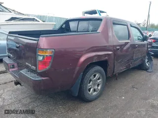 2007 Honda Ridgeline RTX with VIN 2HJYK16367H503022, listed as a IAAI auction lot 41526153 with 141,879 mi miles. Bid and sale history available at carsss.com. Image 4.