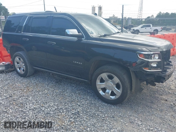 2015 Chevrolet Tahoe LTZ z VIN 1GNSCCKC8FR121461, wystawiony jako IAAI lot #42407901 z przebiegiem 137 729 mil mil oraz . Historia ofert i sprzedaży dostępna na DreamBid. Obrazek 1.