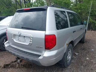 2005 Honda Pilot LX with VIN 2HKYF18185H572190, listed as a IAAI auction lot 42135127 with 201,768 mi miles. Bid and sale history available at carsss.com. Image 4.