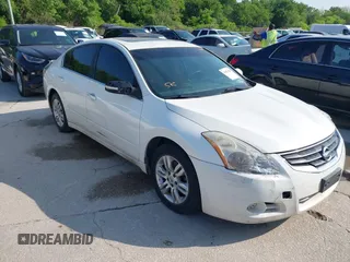 2012 Nissan Altima 2.5 S with VIN 1N4AL2AP8CN523833, listed as a IAAI auction lot 42051428 with 213,604 mi miles. Bid and sale history available at carsss.com. Image 1.