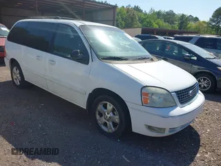 2007 Ford Freestar SEL z VIN 2FMZA52207BA08099, wystawiony jako IAAI lot #42025412 z przebiegiem Nie podano mil oraz . Historia ofert i sprzedaży dostępna na DreamBid. Obrazek 1.