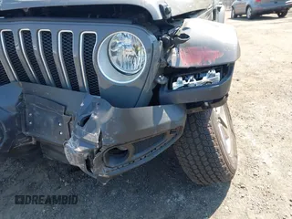 2022 Jeep Wrangler Unlimited Sahara with VIN 1C4HJXEM7NW206585, listed as a IAAI auction lot 42102516 with 10,769 mi miles and . Bid and sale history available at DreamBid. Image 22.