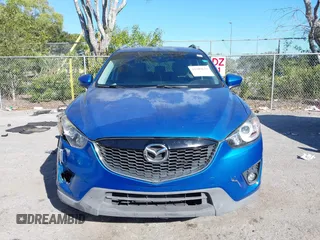 2014 Mazda CX-5 Touring with VIN JM3KE2CYXE0310873, listed as a IAAI auction lot 41309633 with 175,325 mi miles and . Bid and sale history available at DreamBid. Image 13.