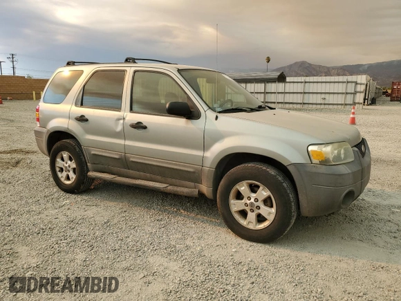 2005 Ford Escape XLT with VIN 1FMYU93Z35KC52175, listed as a Copart auction lot 71214694 with 125,278 mi miles and Salvage Title. Bid and sale history available at carsss.com. Image 4.