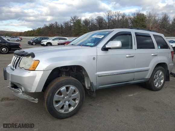 2009 Jeep Grand Cherokee Limited with VIN 1J8HR58T69C523337, listed as a Copart auction lot 82992464 with 156,522 mi miles and Salvage Title. Bid and sale history available at carsss.com. Image 1.