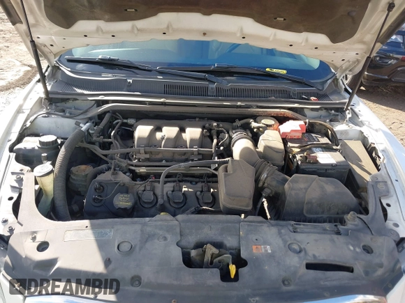 2014 Ford Taurus SEL with VIN 1FAHP2E88EG127074, listed as a IAAI auction lot 41688975 with 186,650 mi miles. Bid and sale history available at carsss.com. Image 10.