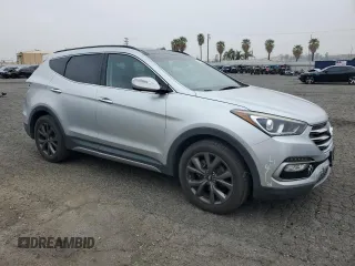 2018 Hyundai Santa Fe Ultimate с VIN 5XYZW4LA5JG513869, выставлен на аукционе Copart как лот 54176545 с пробегом 150 286 миль миль и Списание • Salvage title. История ставок и продаж доступна на DreamBid. Изображение 4.