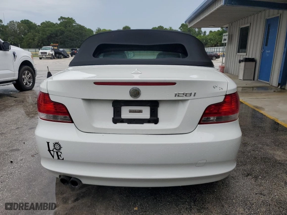 2011 BMW 1 Series 128i with VIN WBAUN1C5XBVH82605, listed as a Copart auction lot 73457334 with 94,969 mi miles and Salvage Title. Bid and sale history available at carsss.com. Image 6.