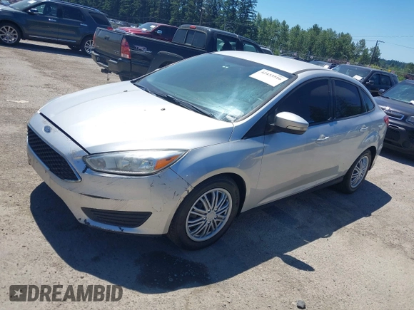 2016 Ford Focus SE with VIN 1FADP3F24GL286330, listed as a IAAI auction lot 42433516 with 130,814 mi miles and . Bid and sale history available at DreamBid. Image 2.
