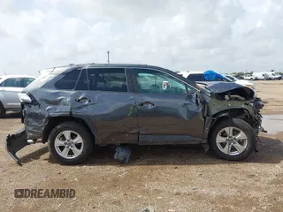 2021 Toyota RAV4 XLE with VIN 2T3W1RFV5MC104078, listed as a IAAI auction lot 42591343 with 57,057 mi miles and . Bid and sale history available at DreamBid. Image 14.