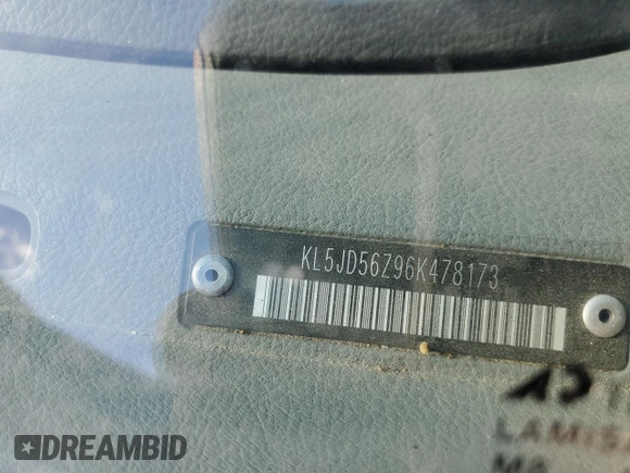 2006 Suzuki Forenza z VIN KL5JD56Z96K478173, wystawiony jako Copart lot #87059644 z przebiegiem 234 059 mil mil oraz Szkoda całkowita • Salvage title. Historia ofert i sprzedaży dostępna na DreamBid. Obrazek 12.