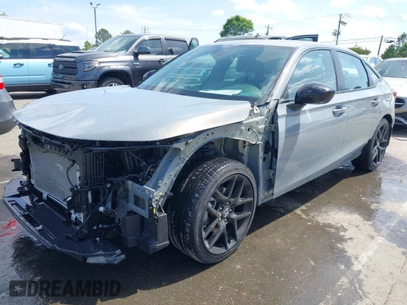 2025 Honda Civic Sport z VIN 2HGFE2F59SH542403, wystawiony jako IAAI lot #42064327 z przebiegiem 12 352 mil mil oraz . Historia ofert i sprzedaży dostępna na DreamBid. Obrazek 17.