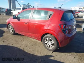 2014 Chevrolet Sonic LT with VIN 1G1JC6SH6E4215294, listed as a IAAI auction lot 41282441 with 107,583 mi miles. Bid and sale history available at carsss.com. Image 3.
