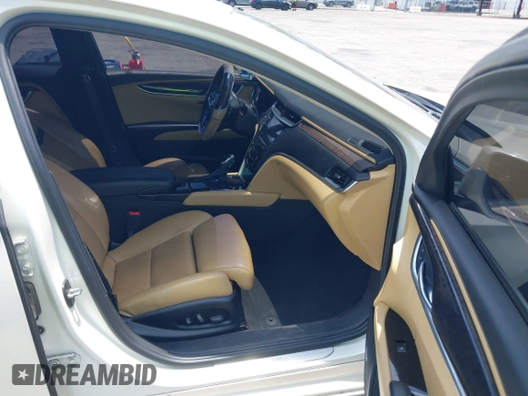 2013 Cadillac XTS Luxury with VIN 2G61P5S38D9160016, listed as a IAAI auction lot 42192602 with 134,879 mi miles and . Bid and sale history available at DreamBid. Image 5.