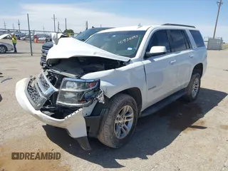 2015 Chevrolet Tahoe LS with VIN 1GNSCAKC3FR687421, listed as a IAAI auction lot 41930895 with Not provided miles and . Bid and sale history available at DreamBid. Image 17.