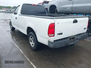 2002 Ford F-150 XL with VIN 1FTRF17242NB86232, listed as a IAAI auction lot 42336859 with 119,321 mi miles and . Bid and sale history available at DreamBid. Image 3.