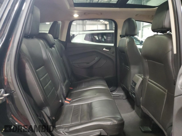 2015 Ford Escape Titanium with VIN 1FMCU9J96FUA43340, listed as a Copart auction lot 55756395 with 142,039 mi miles and Salvage Title. Bid and sale history available at DreamBid. Image 11.