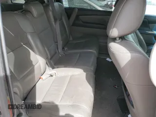 2012 Honda Odyssey Touring z VIN 5FNRL5H93CB070824, wystawiony jako Copart lot #49213465 z przebiegiem 287 745 mil mil oraz Szkoda całkowita • Salvage title. Historia ofert i sprzedaży dostępna na DreamBid. Obrazek 11.