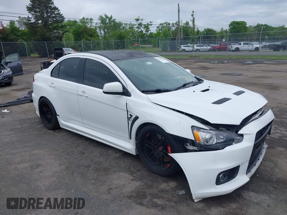 2013 Mitsubishi Lancer Evolution GSR z VIN JA32W8FV0DU023509, wystawiony jako IAAI lot #42222552 z przebiegiem 128 030 mil mil oraz . Historia ofert i sprzedaży dostępna na DreamBid. Obrazek 1.