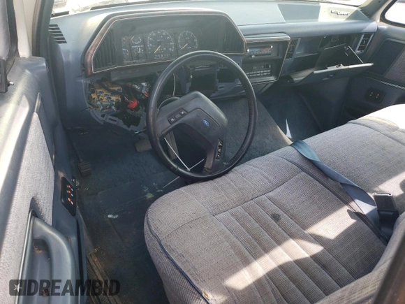 1990 Ford F-150 with VIN 1FTDF15N7LNA52632, listed as a Copart auction lot 60468495 with 8,445 mi miles and Salvage title. Bid and sale history available at DreamBid. Image 8.