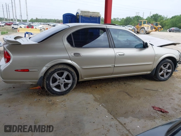 2000 Nissan Maxima GXE z VIN JN1CA31D8YT744603, wystawiony jako IAAI lot #42435490 z przebiegiem Nie podano mil oraz . Historia ofert i sprzedaży dostępna na DreamBid. Obrazek 14.