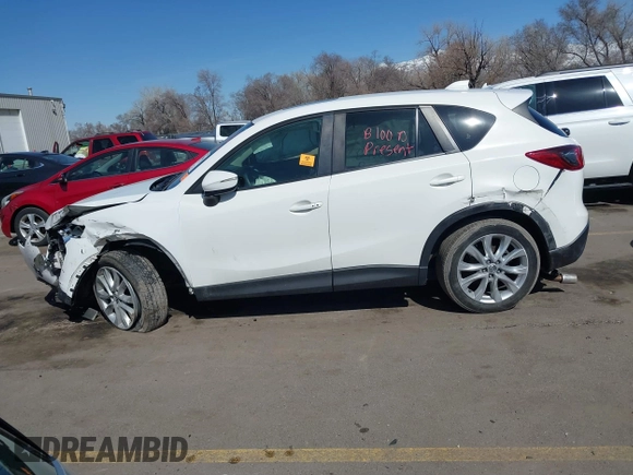2015 Mazda CX-5 Grand Touring with VIN JM3KE4DY5F0526335, listed as a IAAI auction lot 41756046 with 1 mi miles. Bid and sale history available at carsss.com. Image 14.